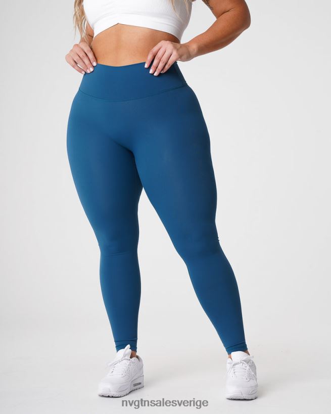 B886LB650 Stillahavsblå kondition NVGTN kvinnor signatur 2.0 leggings