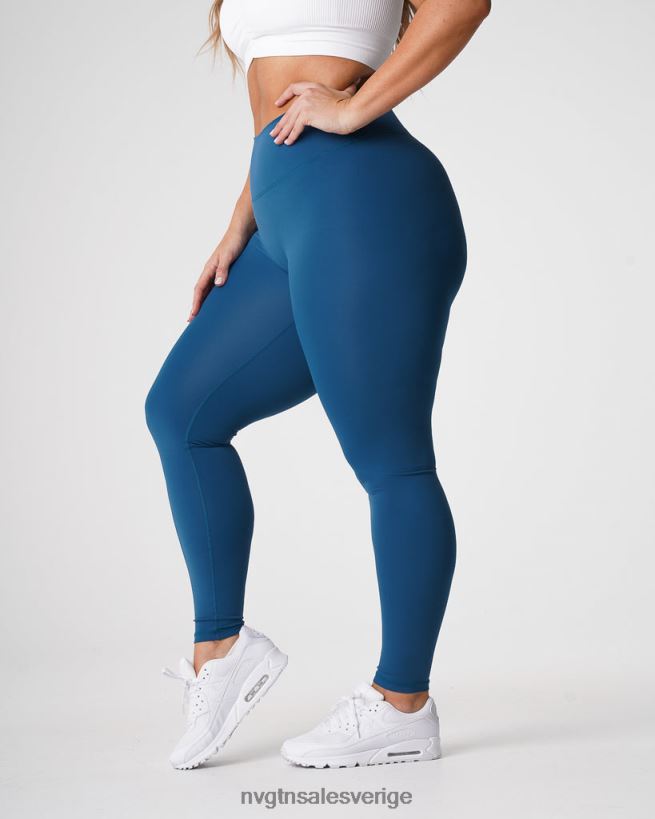 B886LB650 Stillahavsblå kondition NVGTN kvinnor signatur 2.0 leggings