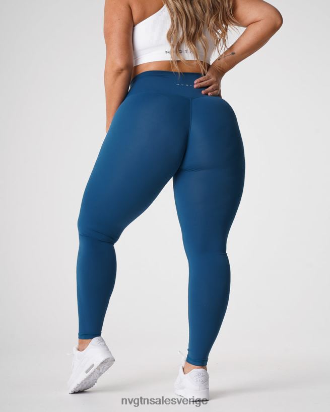 B886LB650 Stillahavsblå kondition NVGTN kvinnor signatur 2.0 leggings